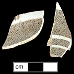 Saucer with grey-brown slip field decorated with manganese speckles and engine turning-from 18BC32-2.