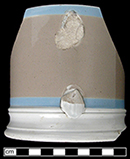 White bodied earthenware mug banded in brown and blue from Hanley, collected by George L. Miller in the late 1980s in Hanley. Cannot be attributed to a specific pottery.