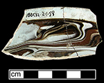 Pearlware saucer with marbleized variegated surface - from 18BC32.