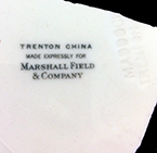 Bowl with rolled rim and painted band and line decoration. Glazed waster. Rim diameter: 8.00”; Vessel height: 1.50”; 5.0 mm thick. Impressed mark “Maddock’s Trenton China” and printed maker’s and retailer’s mark “Trenton China Made Expressly for Marshall Field & Company”