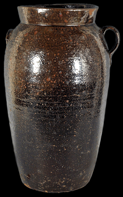 Three-Gallon Alkaline-Glazed Stoneware Jug, Stamped "JFS", James Franklin Seagle,Vale, Lincoln County, NC, third quarter 19th century, highly-ovoid jug with tooled spout, the surface covered in a streaky, olive-green alkaline glaze - from a private collection.