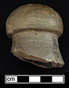 Grey bodied salt glaze stoneware beer bottle impressed "J. GRASBINDER” along shoulder. The interior of the bottle is covered in Albany slip. Bottle height: approx. 10.50”, base diameter: 3.75”, Minimum Vessel 8, from 18BC27.
