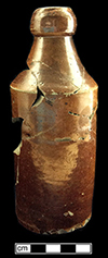 Grey bodied stoneware beer or ginger beer bottle with a dark brown slip glaze of the Albany type. Vessel height: 7.00”, base diameter: 2/50”, MV 6051, from 18PR175.