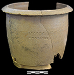 Grey bodied salt glaze stoneware bowl or milk pan with impressed maker’s mark “E.S. Craven”. Enoch Craven (1810-1893) likely started producing wares in the early nineteenth century (Hatch et al. 2017: 81). This pan form, with a flat base and sloping sides, was the “universal form of bowl until after about 1860” (Greer 1981:97).