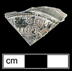 Bottle seal with backwards molded with letters JUN and FRO; Indeterminate diameter, from 18BC51.