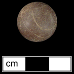 Stone marble from a cellar filled in the late 19th- to early 20th-centuries - click on image to see larger view.