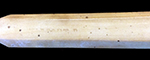 Bone handled toothbrush stamped “Warranted” on the reverse. Elongated hexagonal handle. Privy 5, filled between 1829-1837. 18BC79
