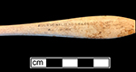 Bone handle with teardrop shape toothbrush with wire drawn attachment and copper alloy staining on back. Stamped on front: “England” near stock and “Hochschild Kohn & Co. Baltimore” and “Drawn Wire/Sterling/Silver Wire” on handle. 18BC92