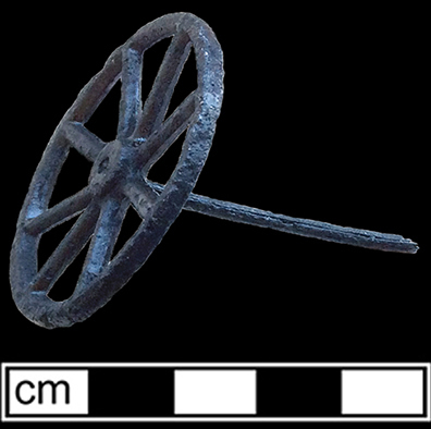 Cast iron wheel.&nbsp;4cm x 4cm, from 18BC27.
