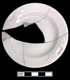 Porcelain plate sized for small child. Molded rim with double leaf motif. 18BC80
