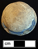 Tin glazed earthenware knobbed lid that has been shaped into a gaming piece - from 18CV91.