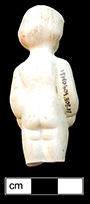 Small Frozen Charlotte doll, with traces of red paint in her hair - from 18MO609.