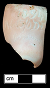 The back part of the neck of a bisque socket head porcelain doll produced in Germany. The mark “1894 AM 5/0 DE” indicates a doll made by the manufacturer Armand Marseille - from 18MO609.