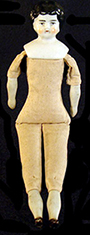 Porcelain leg, brown enamel boot and a blue bow made of Continental European hard paste porcelain. 3.75cm x 1cm - from 18MO609. Doll example on right from a private collection.