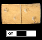 Ivory Domino. 1.5" x .75" - from 18BC27. The game of dominoes  originated in China and made its way to Italy in the early 18th century. Game pieces were often made of ivory and ebony (The Strong). 