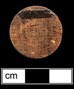Checker game piece made of wood (front and back), 7/8” diameter - from 18BC27, Feature 34.